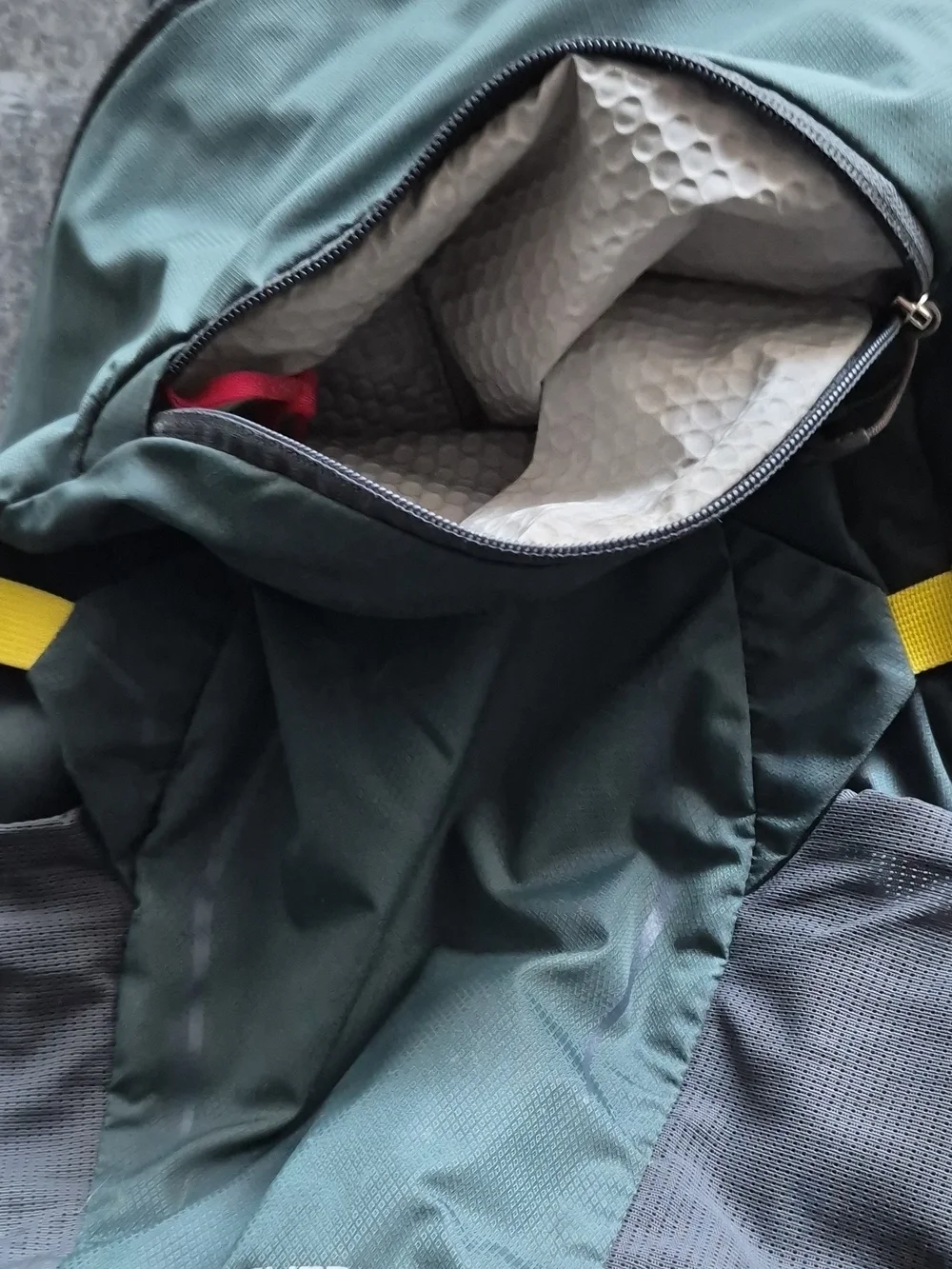 OSPREY Teal Backpack with Yellow Accents and Gray Pockets